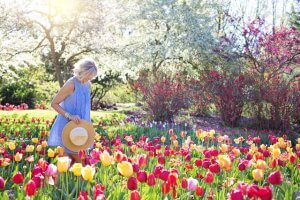 Woman enjoying flowers