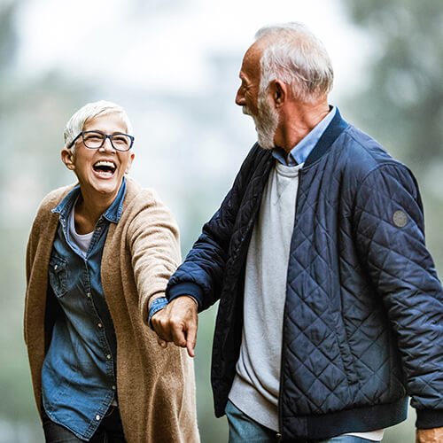 Happy older couple considering pension Happy older couple considering pension