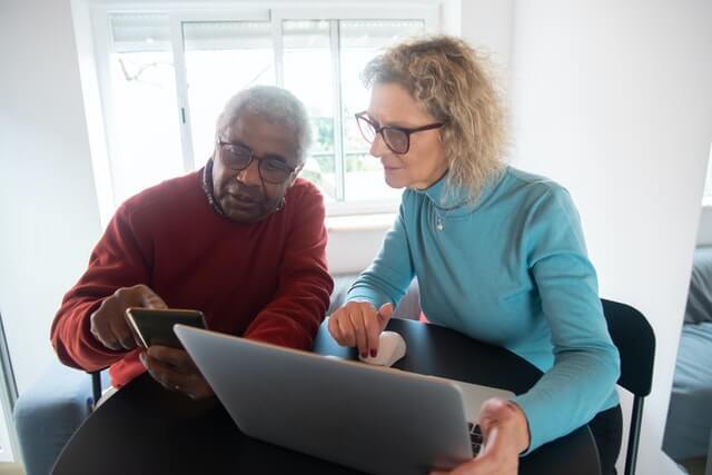 A couple looking up information on their pensions