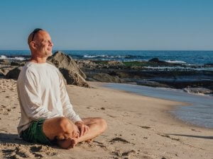 Senior man relaxing on a beach