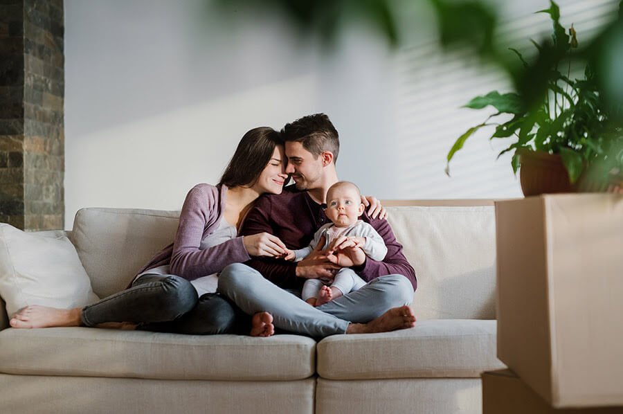Family in their home with a baby